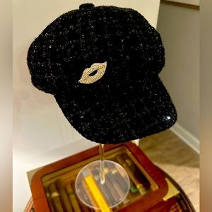 Cute Hat with black sequences & broach